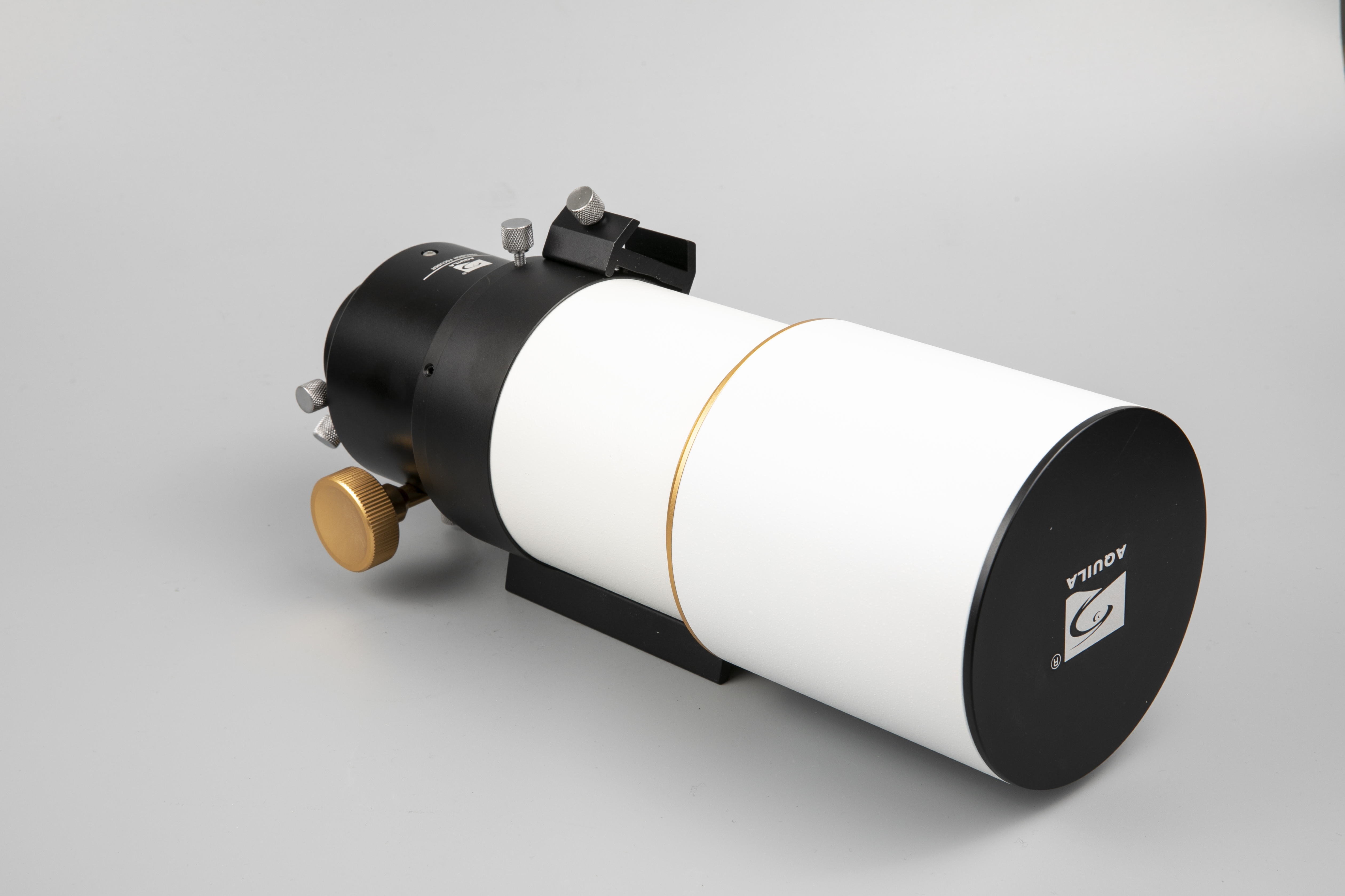 Why is the focal length of the eyepiece short and the focal length of the objective long